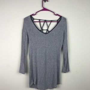 Grey long sleeve shirt with cut out back